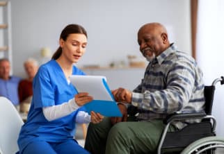 Caregiver helping senior