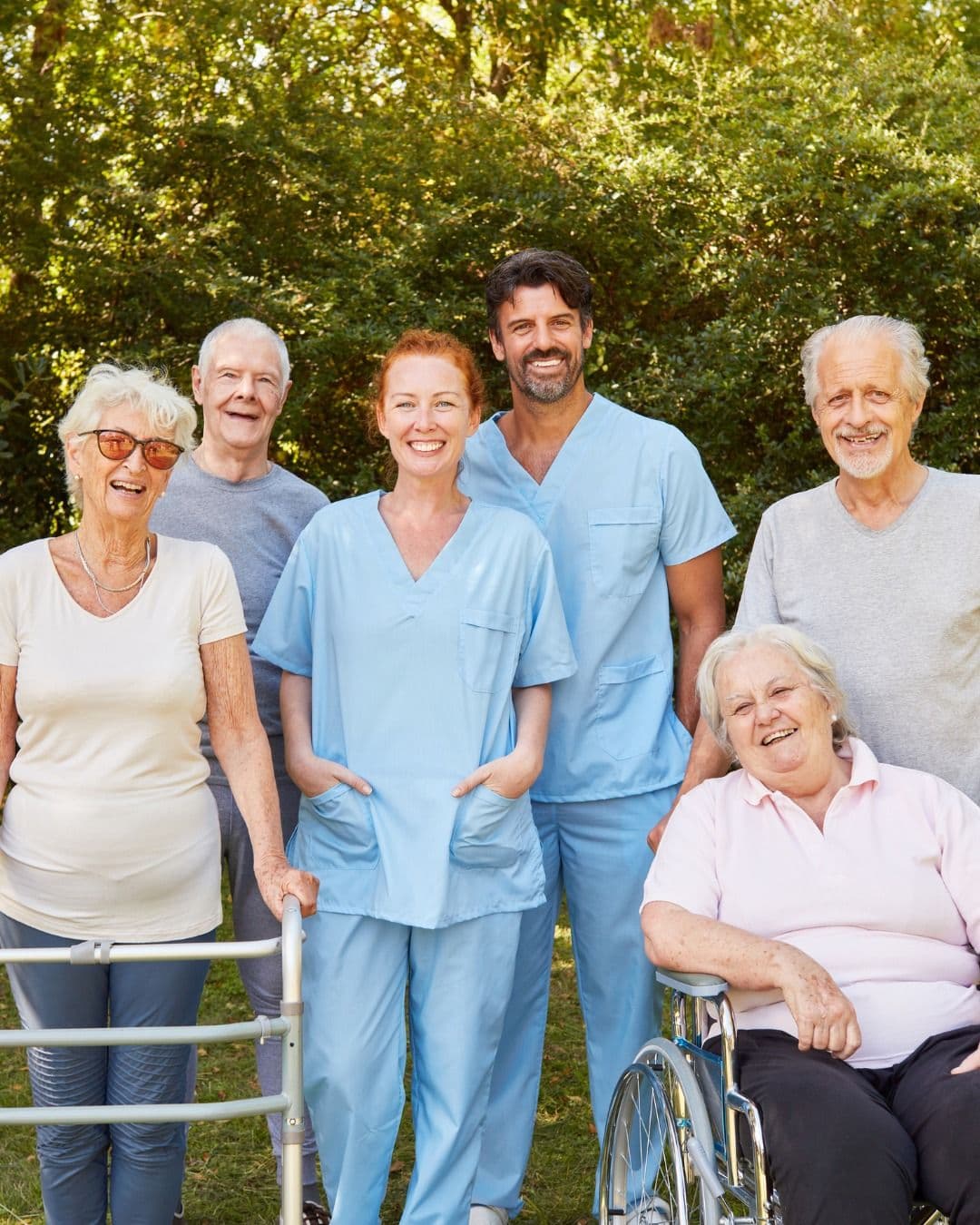 Caregiver holding hands with senior client